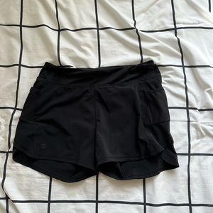 These are the Athleta Girl “run the world 3inch shorts”
